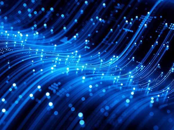 Wholesale Features 2 600x450 A swirl of bright blue lights with dots